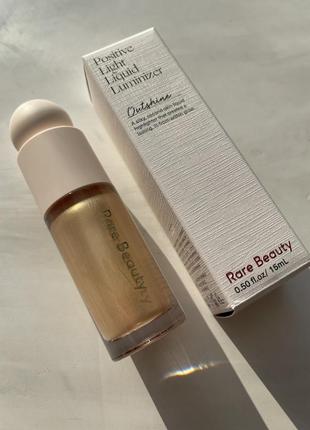 Жидкий хайлайтер rare beauty positive light liquid luminizer outshine1 фото