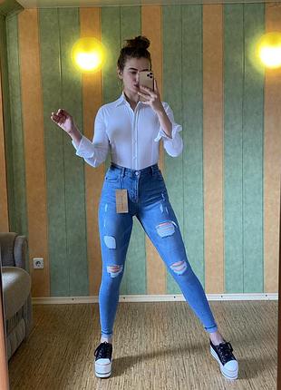 Джинсы рваные legend