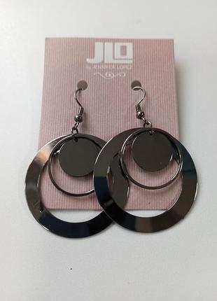 Сережки від бренду jlo