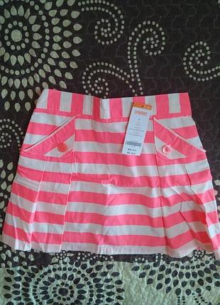 Яскрава коралова,неонова спідниця в смужку