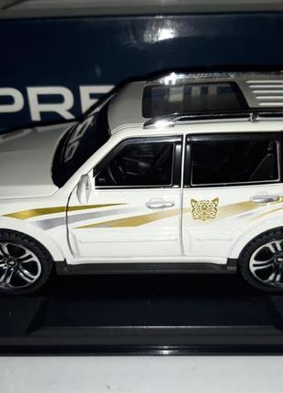 Машинка іграшкова mitsubishi pajero автосвіт premium інерційний 1:32 білий5 фото