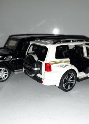 Машинка іграшкова mitsubishi pajero автосвіт premium інерційний 1:32 білий8 фото