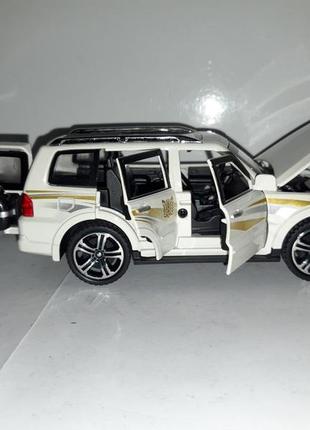 Машинка іграшкова mitsubishi pajero автосвіт premium інерційний 1:32 білий4 фото