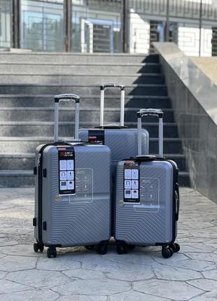 Качественный чемодан из абс пластика,чемодан,дорожная сумка,ручная ляг,сухи размеры1 фото