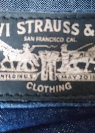 Джинсы levis с расшитыми карманами