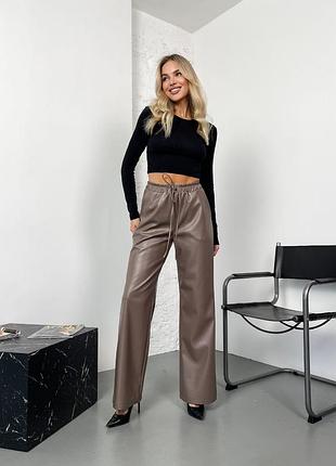 Жіночі брюки клеш з екошкіри на флісі 42-46, 48-52, 54-56
