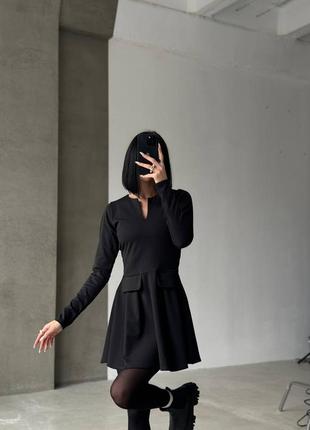 Платье из плотного трикотажа в черном цвете2 фото