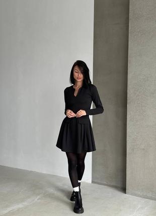 Платье из плотного трикотажа в черном цвете6 фото