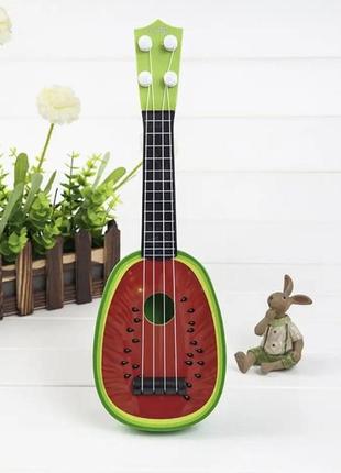 Гитара детская игрушка,  арбуз,  - длина 30 ширина 10 пластик, 4 струны (леска) медиатор ест, от 3 лет зеленый
