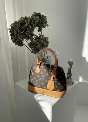 Коричнева класична сумочка з еко шкіри louis vuitton1 фото