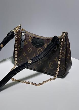 Невелика дуже стильна коричнева сумочка з еко шкіри бренду louis vuitton4 фото