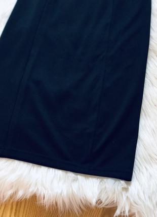 Чорна облягаюча жіноча спідниця4 фото