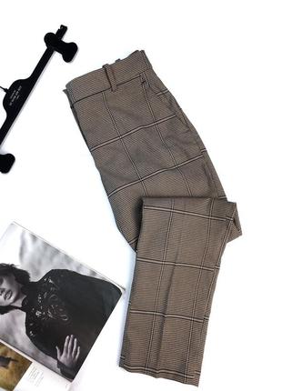 Женские штаны джинсы бежевые чёрные в клетку1 фото