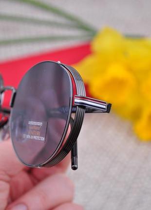 Красивые круглые солнцезащитные очки с боковой шорой gian marco venturi gmv854 окуляри4 фото