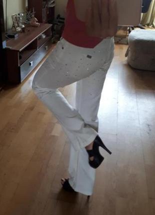 Белые джинсы motivi. дешево!1 фото