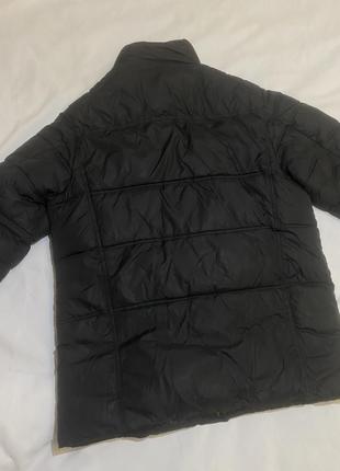 Очень теплая черная дутая зимняя куртка10 фото
