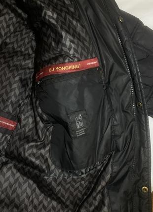 Очень теплая черная дутая зимняя куртка6 фото
