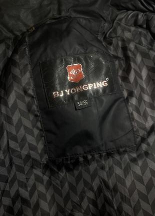 Очень теплая черная дутая зимняя куртка5 фото