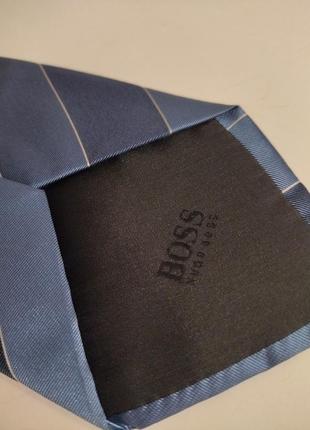 Шовкова краватка, бренду hugo boss у смужку, блакитно синього кольору2 фото