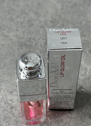 Живильна сяюча олійка для губ dior lip glow oil, 001 pink оригінал2 фото