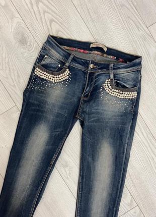 Джинсы джинсы с бусинками1 фото