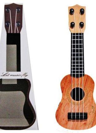 Игрушечная пластиковая гитара светло-коричневая1 фото