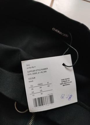 Обтягивающая черная трикотажная юбка с рабочим замком по всей длине3 фото