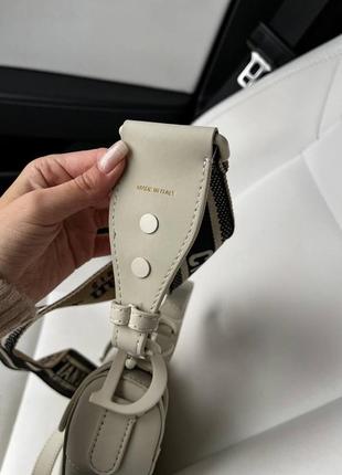 Шкіряна матова сумка сідло у гладкій шкірі з текстильним ремінцем d 6