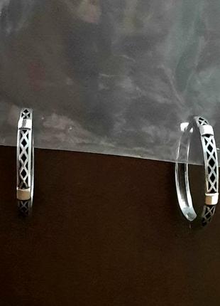 Дизайнерські срібні сережки кільця в старословянському стилі  орнамент золоті накладки 9258 фото