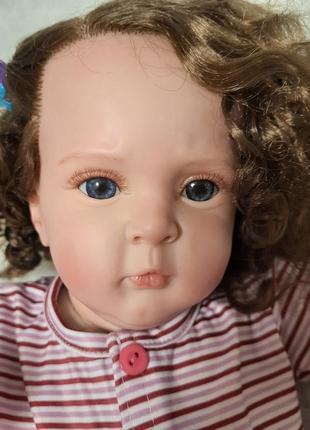 Реалистичная кукла реборн (reborn) 50 см красивая девочка с длиными волосами и мягким телом, как живая5 фото