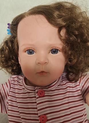 Реалістична лялька реборн (reborn) 50 см гарна дівчинка з довгим волоссям та м'яким тілом, як жива справжня дитина1 фото
