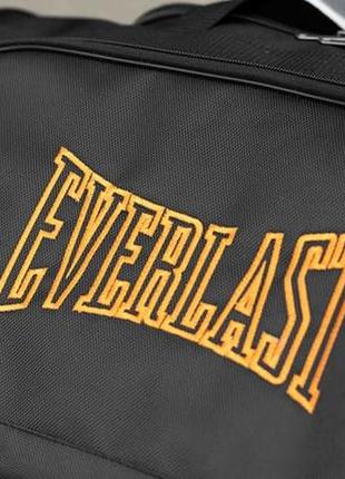 Мужская дорожная сумка everlast orange спортивная черная текстильная на 60л для путешествий4 фото