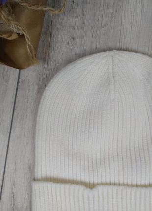 Женская вязанная шапка jolie демисезонная с отворотом белая  размер 55-582 фото
