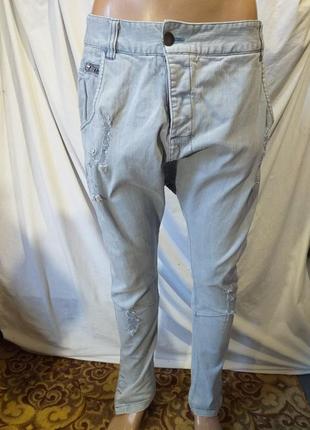 Джинсы с низкой слонкой- тренд сезона.