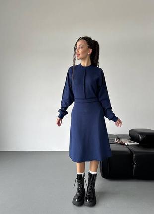 Стильна, жіночна та стримана сукня міді на кожен день та на усі випадки життя