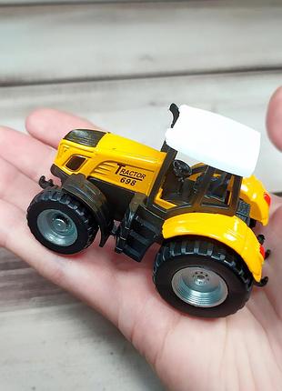 Дитячий кишеньковий інерційний трактор міні (жовтий), інерційна машинка для хлопчика металопластик