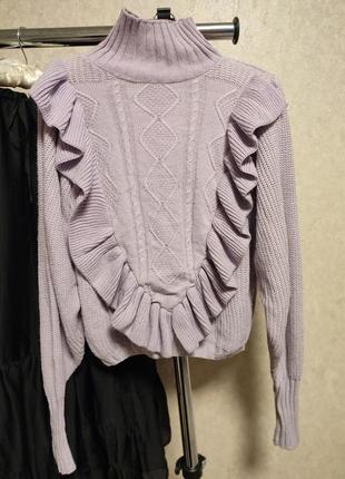 Ніжний бузковий светр з рюшем1 фото