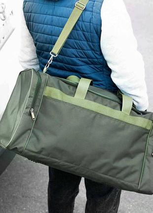Большая дорожная спортивная сумка bul зеленая текстильная для поездок на 60л прочная1 фото