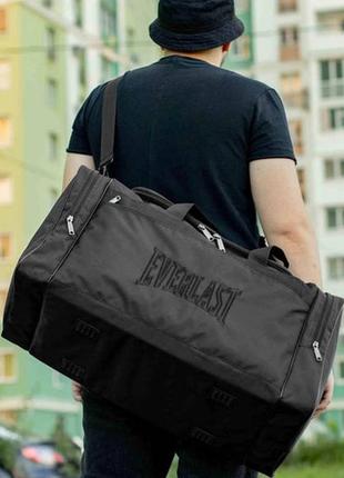 Большая дорожная спортивная сумка everlast bl черная текстильная для поездок на 60л прочная1 фото