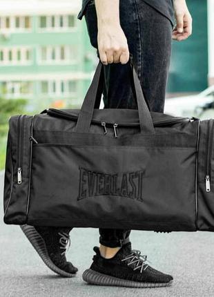 Большая дорожная спортивная сумка everlast bl черная текстильная для поездок на 60л прочная3 фото