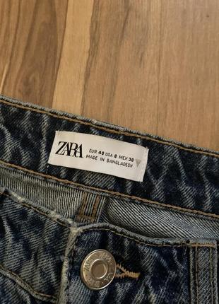 Джинсы с рваными коленями zara7 фото