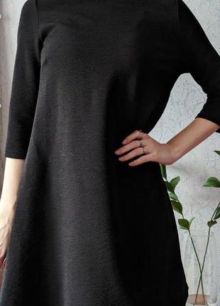 Чорна тепла сукня зі структурованої тканини бренду atmosphere4 фото