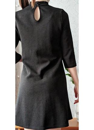 Черное теплое платье из структурированной ткани бренда atmosphere5 фото