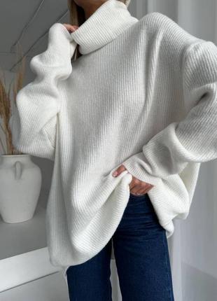 Вʼязаний жіночий оверсайз светр - туніка з високим горлом однотонний6 фото
