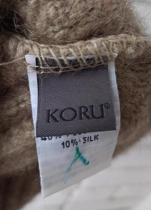 Теплая шапка от бренда koru из меха оппосума, мериноса м шелка2 фото