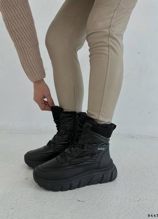 Модні чорні жіночі зимові спортивні черевики7 фото