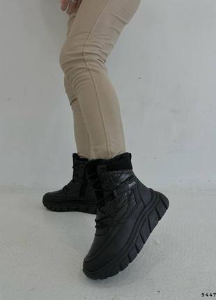 Модні чорні жіночі зимові спортивні черевики8 фото