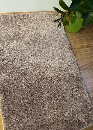 Украшенный ковер розовый