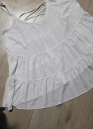 Базовая белая блуза с баской1 фото