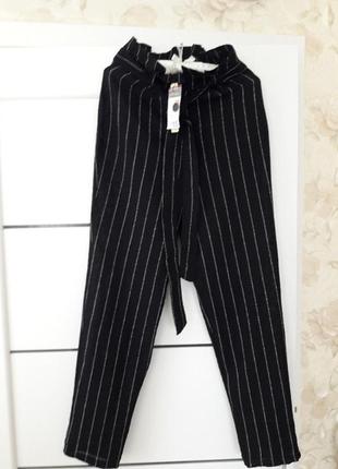 Штани чорні в смужку primark